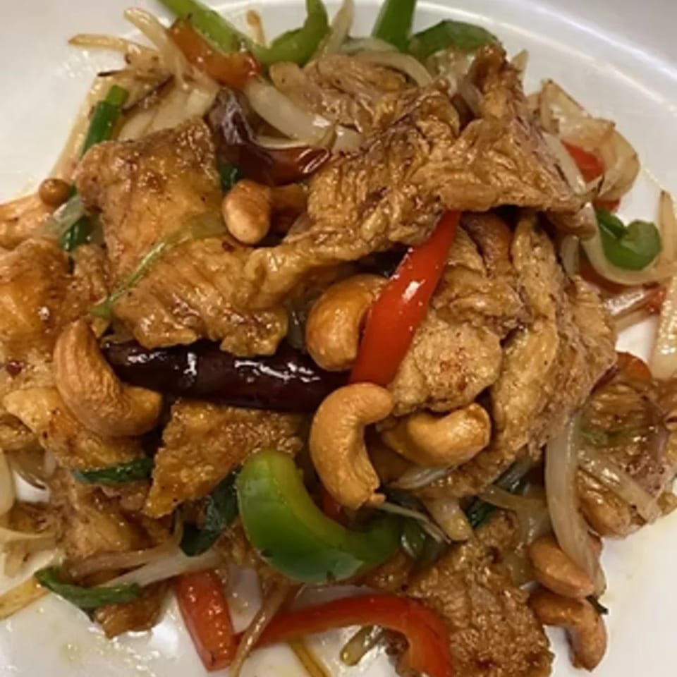Charm Thai Cuisine's cashew chicken stir-fry with bell peppers, onions, and dried chilies.